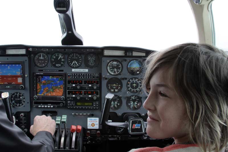Zac in the copilot's seat going to Glacier Bay