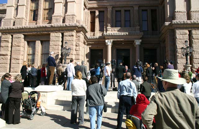 The Capital steps with press conference in progress