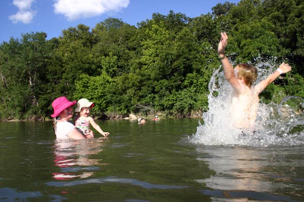 Lisa and Lucy marvel as Zac flies out of the river