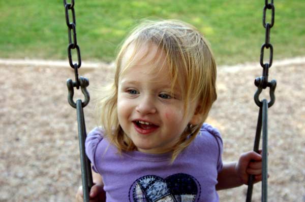 Lucy enjoying the swing