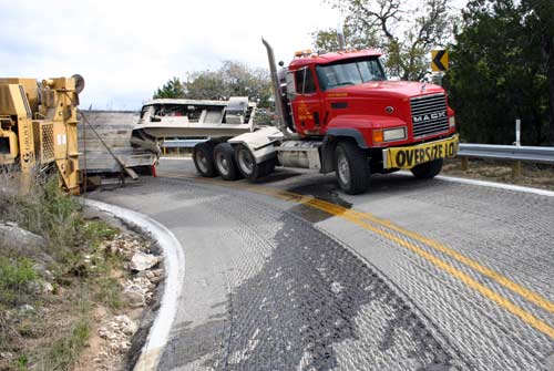 Diesel fuel spilling on road