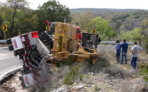 Explaining overturned truck to the boss