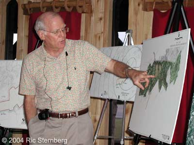 Bill Gunn points out the planned houses.