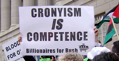 Sign says "Cronyism IS Competence"