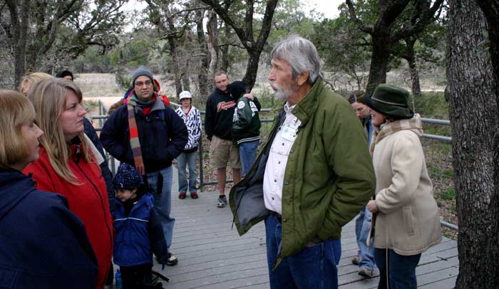 John Ahrns and the tour at theWestcave Preserve deck overlooking the Pedernales River